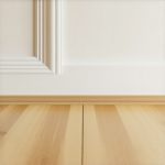 Stop Baseboard Gaps: Why Coping Beats Miters in 2026