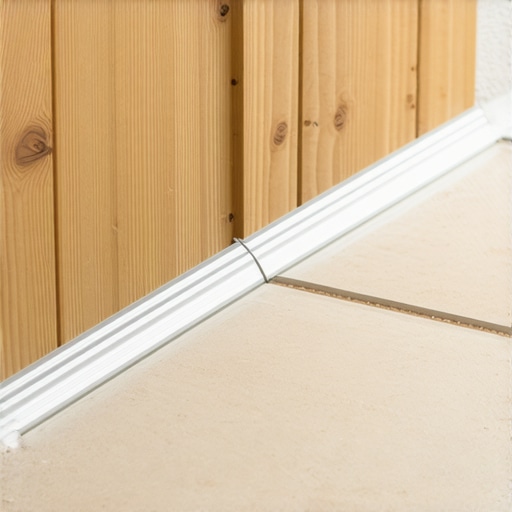 Installing a Z-Bar for Seamless Carpet Transitions A close-up view of a metal Z-bar transition strip placed between tile and subfloor.