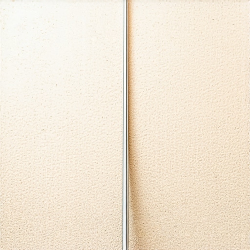 Close-up of a power stretcher tool being used to remove ripples from a carpet in a home environment.